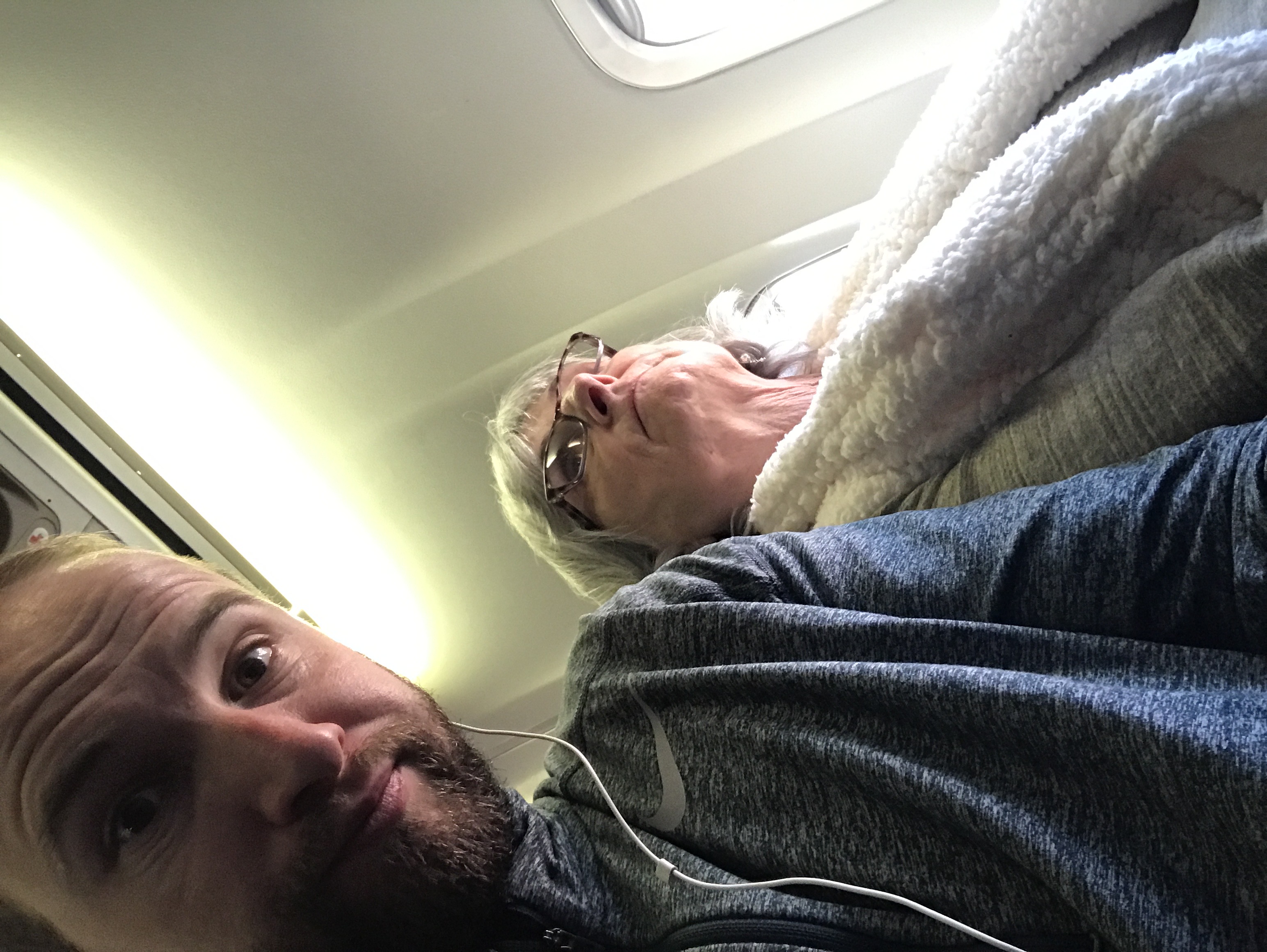 Mom asleep on the plane